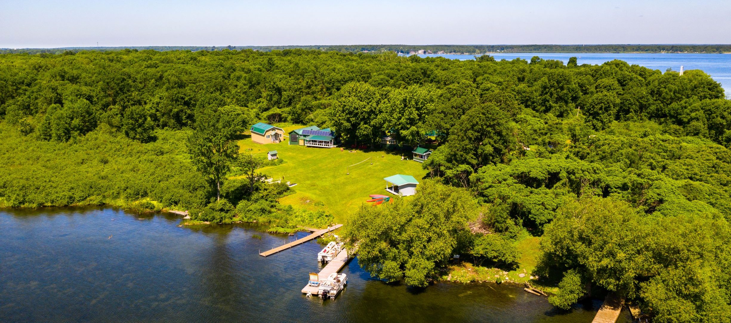 Set on a verdant island in the St. Lawrence River, the Thompson Island Cultural Camp is an immersive, multifunctional facility offering a unique view of Akwesasne. The eco-cultural camp connects visitors with nature and Akwesasne culture in a tranquil setting.