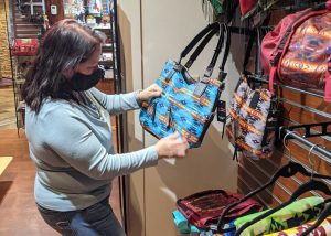 Woman shopping at the Akwesasne Mohawk Casino wearing a mask